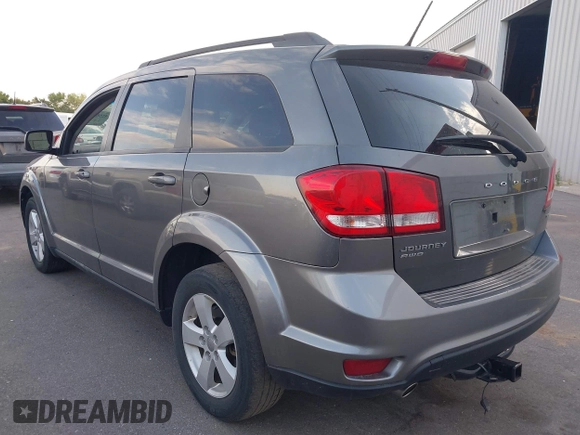 2012 Dodge Journey SXT with VIN 3C4PDDBG2CT333537, listed as a IAAI auction lot 42556329 with 172,834 mi miles and . Bid and sale history available at DreamBid. Image 3.