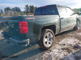 2015 Chevrolet Silverado 1500 LT with VIN 3GCUKREH7FG109509, listed as a IAAI auction lot 41303550 with 75,263 mi miles. Bid and sale history available at carsss.com. Image 4.