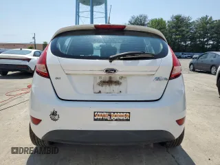 2012 Ford Fiesta SE z VIN 3FADP4EJ9CM148404, wystawiony jako Copart lot #59150695 z przebiegiem 84 705 mil mil oraz Czysty tytuł • Clean title. Historia ofert i sprzedaży dostępna na DreamBid. Obrazek 6.