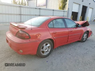 2004 Pontiac Grand Am GT with VIN 1G2NW52E34C155905, listed as a Copart auction lot 77431154 with 154,269 mi miles and Salvage Title. Bid and sale history available at carsss.com. Image 3.