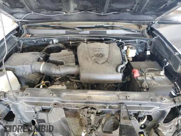 2023 Toyota Tacoma SR z VIN 3TMCZ5AN4PM599664, wystawiony jako Copart lot #57462455 z przebiegiem 65 736 mil mil oraz Szkoda całkowita • Salvage title. Historia ofert i sprzedaży dostępna na DreamBid. Obrazek 11.