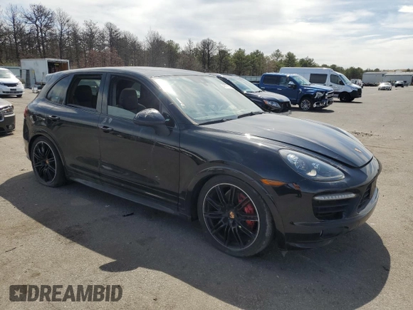 2014 Porsche Cayenne GTS z VIN WP1AD2A26ELA77822, wystawiony jako Copart lot #49171305 z przebiegiem Nie podano mil oraz Czysty tytuł • Clean title. Historia ofert i sprzedaży dostępna na DreamBid. Obrazek 4.