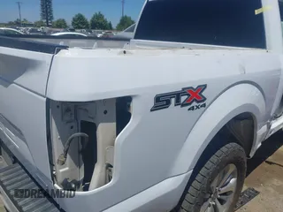2018 Ford F-150 XL with VIN 1FTEW1EP8JKF82063, listed as a IAAI auction lot 42299414 with 153,706 mi miles and . Bid and sale history available at DreamBid. Image 22.