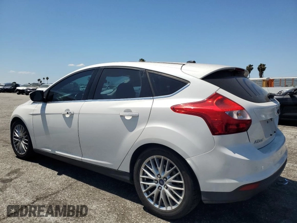 2014 Ford Focus Titanium with VIN 1FADP3N21EL264509, listed as a Copart auction lot 59544475 with 154,142 mi miles and Clean title. Bid and sale history available at DreamBid. Image 2.