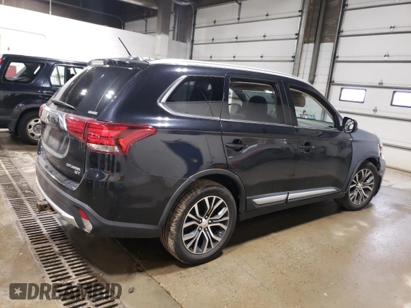 2016 Mitsubishi Outlander GT with VIN JA4JZ4AX7GZ011316, listed as a Copart auction lot 58734695 with 188,955 mi miles and Salvage title. Bid and sale history available at DreamBid. Image 3.