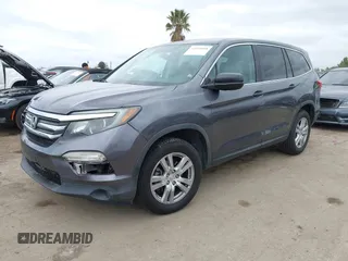 2016 Honda Pilot LX with VIN 5FNYF5H14GB037205, listed as a IAAI auction lot 42034018 with 101,943 mi miles and . Bid and sale history available at DreamBid. Image 17.