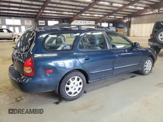 2000 Hyundai Elantra z VIN KMHJW35F5YU181324, wystawiony jako Copart lot #48016775 z przebiegiem 79 686 mil mil oraz Czysty tytuł • Clean title. Historia ofert i sprzedaży dostępna na DreamBid. Obrazek 3.