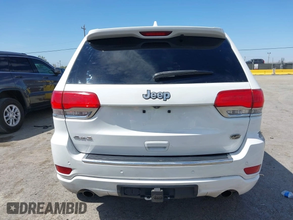 2015 Jeep Grand Cherokee Overland with VIN 1C4RJFCG3FC230185, listed as a IAAI auction lot 42494650 with 123,128 mi miles and . Bid and sale history available at DreamBid. Image 16.