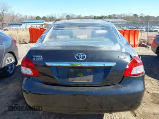 2009 Toyota Yaris z VIN JTDBT903291338232, wystawiony jako IAAI lot #41699916 z przebiegiem Nie podano mil oraz . Historia ofert i sprzedaży dostępna na DreamBid. Obrazek 11.
