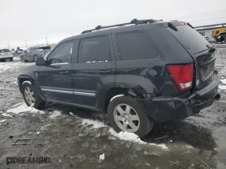 2010 Jeep Grand Cherokee Laredo with VIN 1J4RR4GT2AC107520, listed as a Copart auction lot 86554664 with 141,517 mi miles and Salvage Title. Bid and sale history available at carsss.com. Image 2.