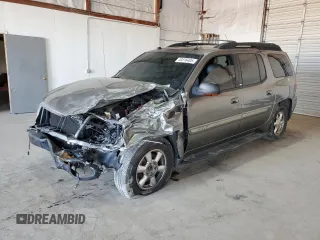2004 GMC Envoy SLT with VIN 1GKET16S146222288, listed as a Copart auction lot 49316405 with 210,424 mi miles and Salvage Title. Bid and sale history available at DreamBid. Image 1.