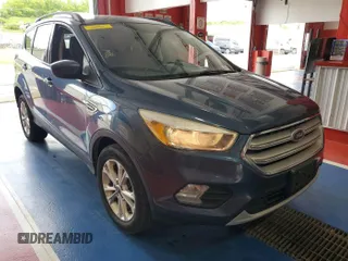 2018 Ford Escape SE z VIN 1FMCU9GD2JUA75853, wystawiony jako IAAI lot #42399997 z przebiegiem 89 772 mil mil oraz . Historia ofert i sprzedaży dostępna na DreamBid. Obrazek 19.