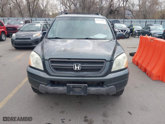 2004 Honda Pilot EX with VIN 2HKYF18644H516791, listed as a IAAI auction lot 41876348 with 291,358 mi miles. Bid and sale history available at carsss.com. Image 6.