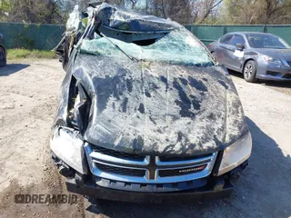 2013 Dodge Avenger SE with VIN 1C3CDZAB7DN580897, listed as a IAAI auction lot 41988683 with Not Provided miles and . Bid and sale history available at carsss.com. Image 13.