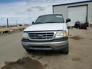 2003 Ford F-150 XL with VIN 2FTPX18L83CA04356, listed as a Copart auction lot 45232695 with 273,755 mi miles and Salvage Title. Bid and sale history available at carsss.com. Image 10.