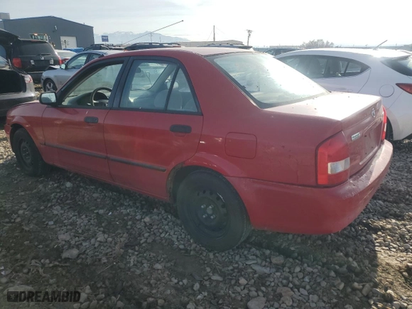 2000 Mazda Protege DX with VIN JM1BJ2225Y0309023, listed as a Copart auction lot 85962334 with 237,922 mi miles and Salvage Title. Bid and sale history available at carsss.com. Image 2.