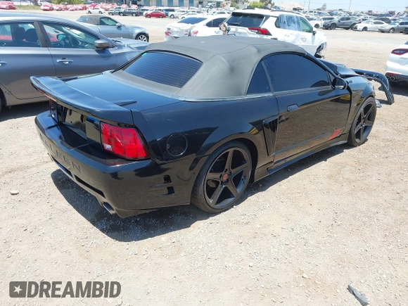 2002 Ford Mustang GT Deluxe with VIN 1FAFP45X92F229236, listed as a IAAI auction lot 42565552 with 122,504 mi miles and . Bid and sale history available at DreamBid. Image 4.