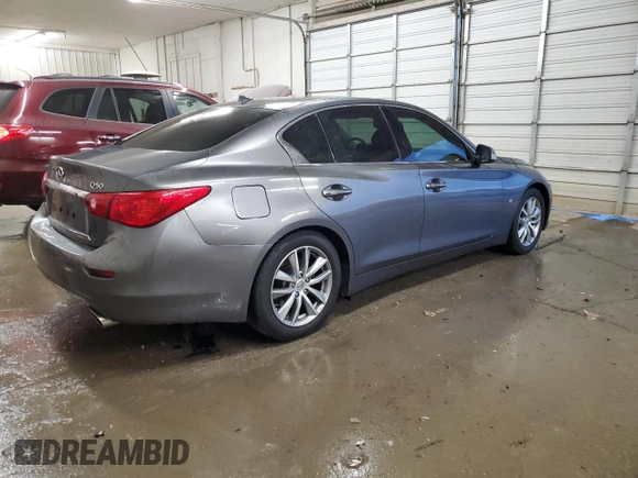 2015 Infiniti Q50 Premium with VIN JN1BV7AP8FM337048, listed as a Copart auction lot 83052064 with 128,640 mi miles and Salvage Title. Bid and sale history available at carsss.com. Image 3.