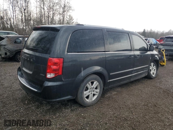 2011 Dodge Grand Caravan Crew with VIN 2D4RN5DG2BR762738, listed as a Copart auction lot 49528955 with 203,748 mi miles and Clean Title. Bid and sale history available at DreamBid. Image 3.