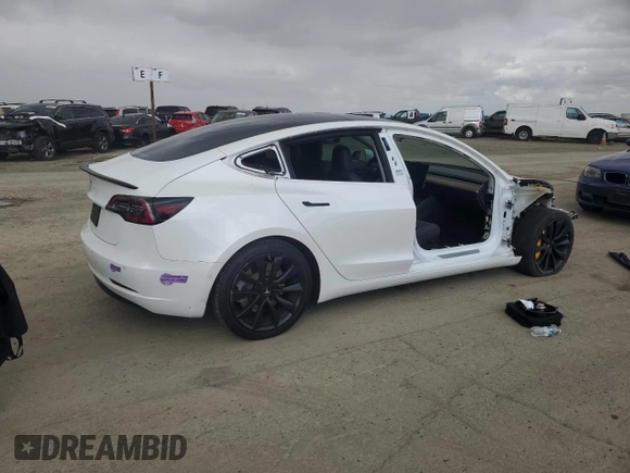 2019 Tesla Model 3 Mid Range with VIN 5YJ3E1EA8KF412886, listed as a Copart auction lot 50824565 with 54,803 mi miles and Salvage Title. Bid and sale history available at carsss.com. Image 3.
