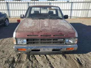 1989 Nissan Hardbody z VIN 1N6ND11S7KC371977, wystawiony jako Copart lot #77245404 z przebiegiem 202 526 mil mil oraz Tytuł czysty. Historia ofert i sprzedaży dostępna na DreamBid. Obrazek 5.