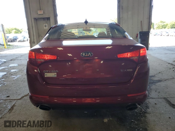 2013 Kia Optima EX z VIN 5XXGN4A79DG110715, wystawiony jako Copart lot #63193895 z przebiegiem 103 120 mil mil oraz Nie do naprawy • Non repairable. Historia ofert i sprzedaży dostępna na DreamBid. Obrazek 6.