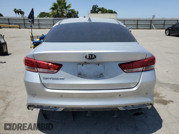 2018 Kia Optima S with VIN 5XXGT4L37JG197736, listed as a Copart auction lot 57527615 with 70,204 mi miles and Salvage title. Bid and sale history available at DreamBid. Image 6.