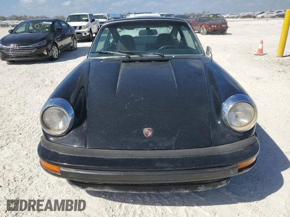 1975 Porsche 911 with VIN 9115202267, listed as a Copart auction lot 75863884 with 61,298 mi miles and Salvage title. Bid and sale history available at DreamBid. Image 5.