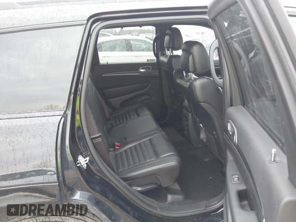 2021 Jeep Grand Cherokee 80th Anniversary with VIN 1C4RJFBG7MC828116, listed as a IAAI auction lot 42118355 with 57,240 mi miles and . Bid and sale history available at DreamBid. Image 8.