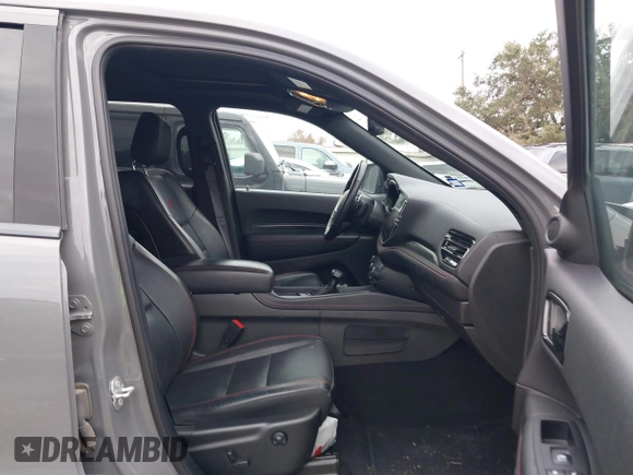 2023 Dodge Durango GT Plus with VIN 1C4RDHDG3PC601932, listed as a IAAI auction lot 41238697 with 56,294 mi miles and . Bid and sale history available at DreamBid. Image 5.