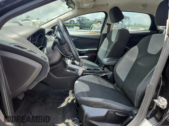 2012 Ford Focus SE z VIN 1FAHP3K25CL248672, wystawiony jako Copart lot #58129345 z przebiegiem 124 687 mil mil oraz Szkoda całkowita • Salvage title. Historia ofert i sprzedaży dostępna na DreamBid. Obrazek 7.