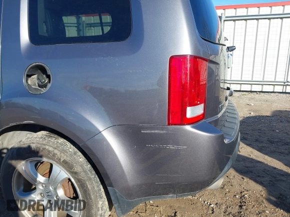 2015 Honda Pilot EX-L with VIN 5FNYF4H59FB060023, listed as a IAAI auction lot 41327793 with 197,981 mi miles and . Bid and sale history available at carsss.com. Image 6.