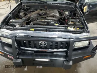 2004 Toyota Tacoma with VIN 5TEWN72N14Z424211, listed as a Copart auction lot 51815615 with 203,415 mi miles and Salvage Title. Bid and sale history available at DreamBid. Image 11.
