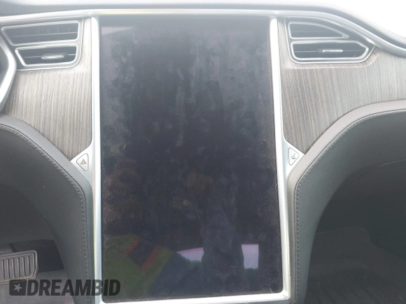 2013 Tesla Model S с VIN 5YJSA1CN4DFP26552, выставлен на аукционе IAAI как лот 42370183 с пробегом Не указан миль и . История ставок и продаж доступна на DreamBid. Изображение 7.