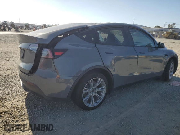 2024 Tesla Model Y Long Range with VIN 7SAYGDEE1RA245642, listed as a Copart auction lot 55490385 with Not provided miles and Salvage title. Bid and sale history available at DreamBid. Image 3.