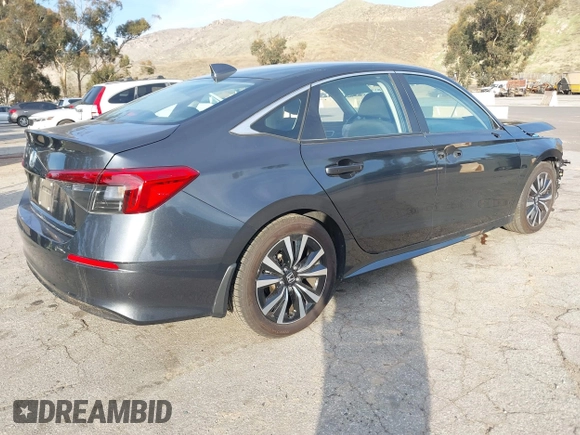 2024 Honda Civic Sedan EX with VIN 2HGFE1F77RH313871, listed as a IAAI auction lot 41611811 with 21,952 mi miles. Bid and sale history available at carsss.com. Image 4.