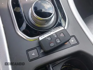2014 Land Rover Range Rover Evoque Dynamic with VIN SALVT2BG0EH893971, listed as a IAAI auction lot 42445559 with 124,229 mi miles and . Bid and sale history available at DreamBid. Image 11.