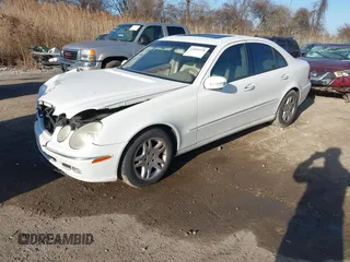 2005 Mercedes-Benz E-Class 3.2L CDI with VIN WDBUF26J75A615933, listed as a IAAI auction lot 41839378 with 124,135 mi miles. Bid and sale history available at carsss.com. Image 2.