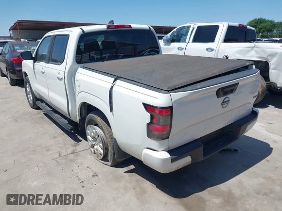 2022 Nissan Frontier SV z VIN 1N6ED1EJ8NN650378, wystawiony jako IAAI lot #39310357 z przebiegiem 45 898 mil mil oraz . Historia ofert i sprzedaży dostępna na DreamBid. Obrazek 3.