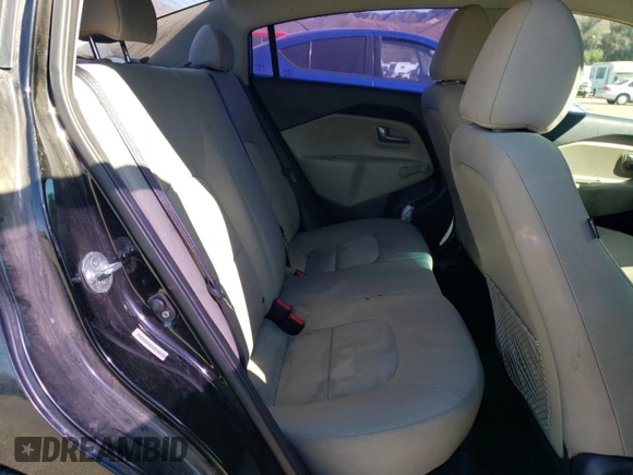 2014 Kia Rio LX with VIN KNADM4A35E6407058, listed as a Copart auction lot 72997044 with 76,215 mi miles and Salvage Title. Bid and sale history available at DreamBid. Image 10.