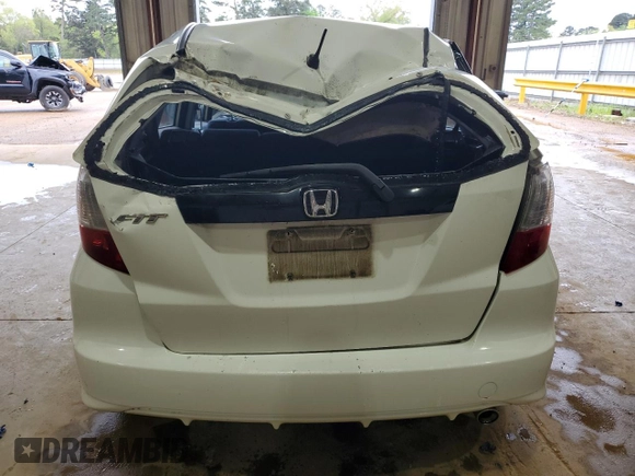 2009 Honda Fit Sport with VIN JHMGE88419S026712, listed as a Copart auction lot 51165865 with 54,586 mi miles and Salvage Title. Bid and sale history available at carsss.com. Image 6.