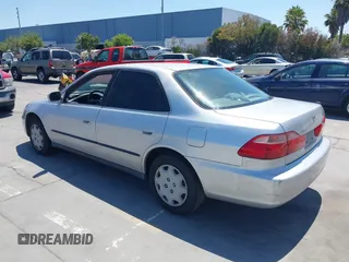 1999 Honda Accord LX with VIN JHMCG665XXC033464, listed as a IAAI auction lot 42687150 with 194,076 mi miles and . Bid and sale history available at DreamBid. Image 3.