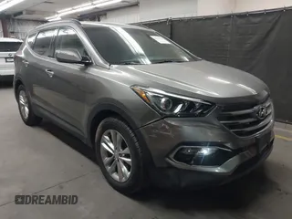 2018 Hyundai Santa Fe 2.0T z VIN 5XYZU4LA4JG570280, wystawiony jako IAAI lot #42149078 z przebiegiem 86 401 mil mil oraz . Historia ofert i sprzedaży dostępna na DreamBid. Obrazek 1.
