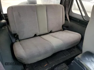 2003 Jeep Wrangler SE with VIN 1J4FA29103P313229, listed as a Copart auction lot 79337984 with 135,668 mi miles and Salvage title. Bid and sale history available at DreamBid. Image 11.