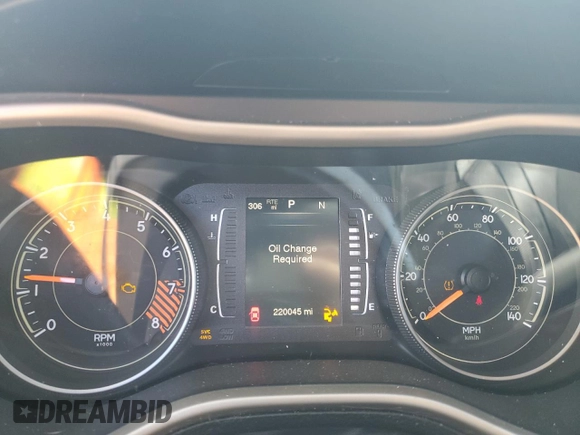 2015 Jeep Cherokee North with VIN 1C4PJMCSXFW582677, listed as a Copart auction lot 67999984 with 220,045 mi miles and Salvage Title. Bid and sale history available at carsss.com. Image 9.