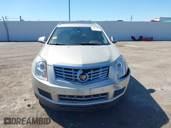 2015 Cadillac SRX Luxury Collection z VIN 3GYFNBE38FS641807, wystawiony jako IAAI lot #41669512 z przebiegiem 147 889 mil mil oraz . Historia ofert i sprzedaży dostępna na DreamBid. Obrazek 12.