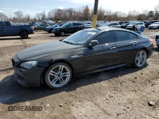 2015 BMW 6 Series 640i with VIN WBA6A0C5XFD318947, listed as a Copart auction lot 50228615 with 78,202 mi miles and Salvage Title. Bid and sale history available at carsss.com. Image 1.