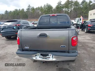 2003 Ford F-150 XLT with VIN 1FTRW08L63KA37275, listed as a IAAI auction lot 41875128 with 133,257 mi miles. Bid and sale history available at carsss.com. Image 16.