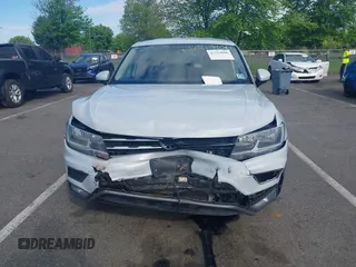 2018 Volkswagen Tiguan S with VIN 3VV0B7AX5JM025815, listed as a IAAI auction lot 42219906 with 168,122 mi miles and . Bid and sale history available at DreamBid. Image 12.