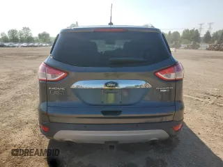 2016 Ford Escape Titanium with VIN 1FMCU9J98GUB32375, listed as a Copart auction lot 59564885 with 123,548 mi miles and Salvage title. Bid and sale history available at DreamBid. Image 6.